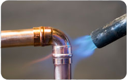 Laurel plumbing contractor sweats copper pipes